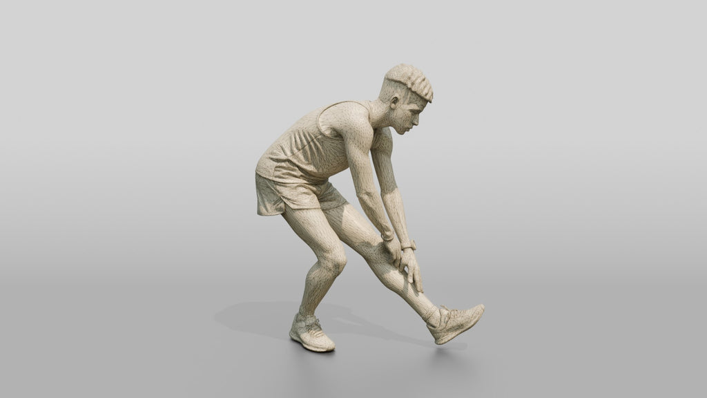 Athletic Young Moroccan Man Stretching Before a Run