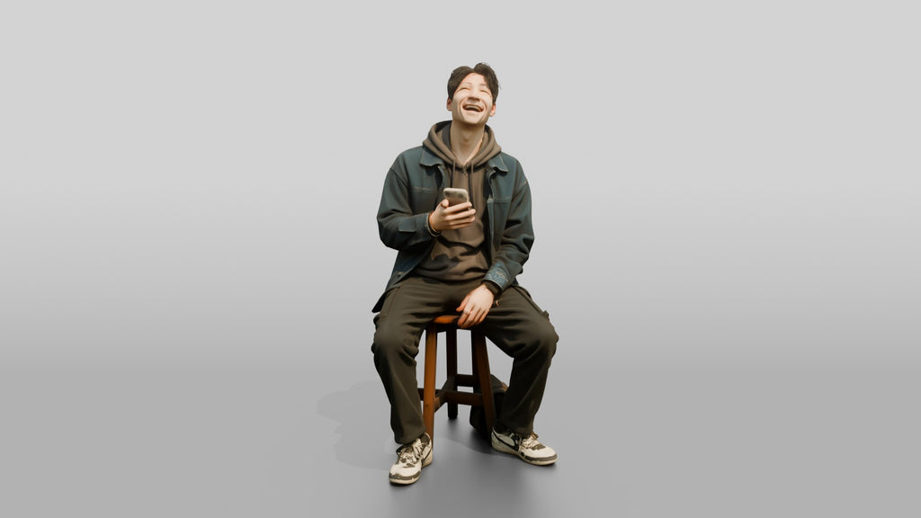 Asian Man Laughing at Phone