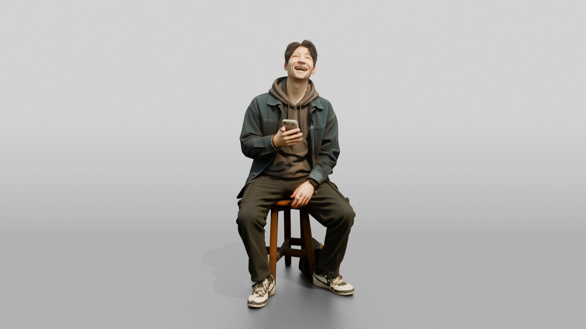 Asian Man Laughing at Phone