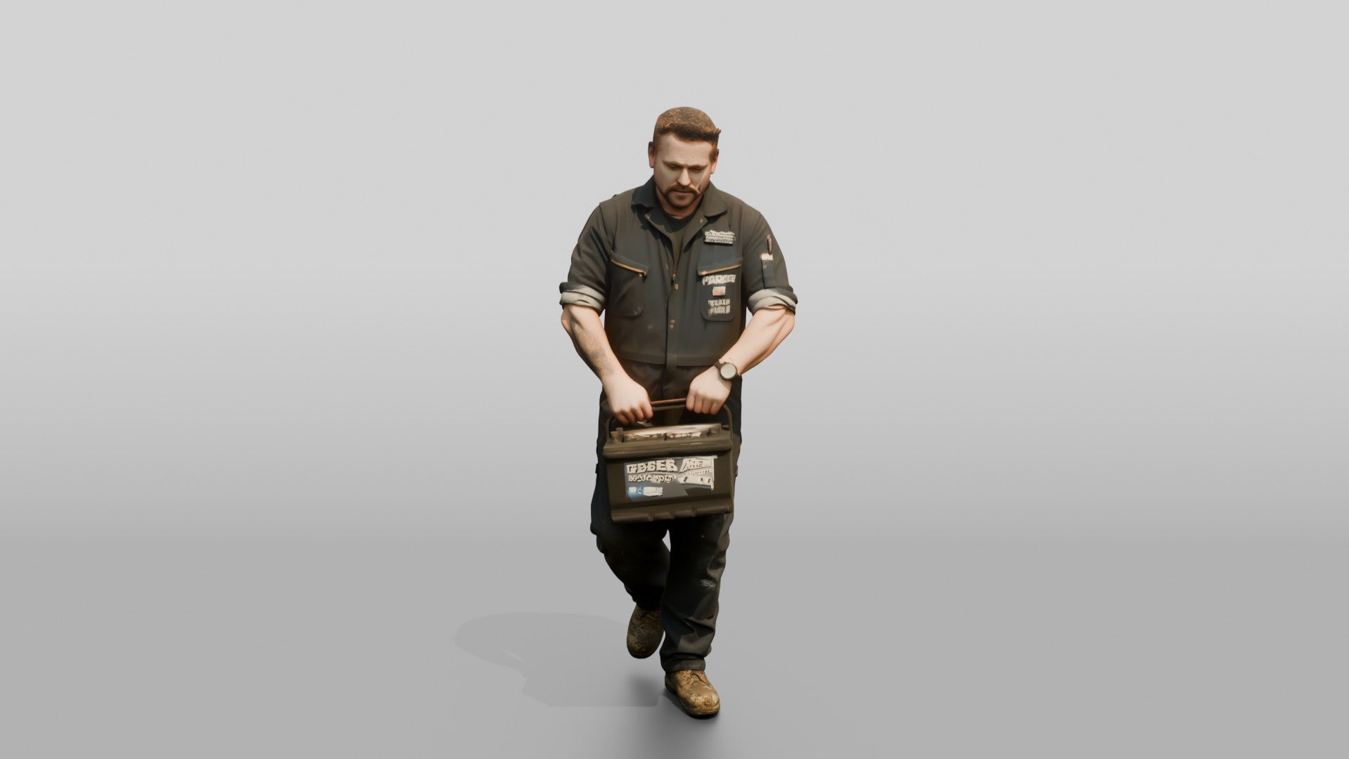 Mechanic Carrying a Car Battery