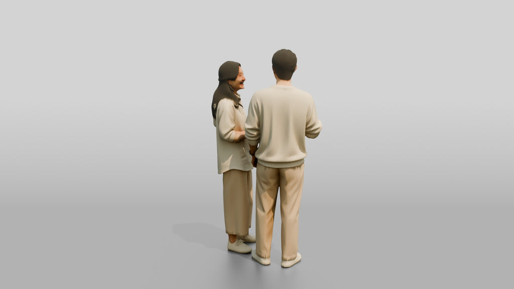 Laughing Couple in Coordinated Cream Outfits
