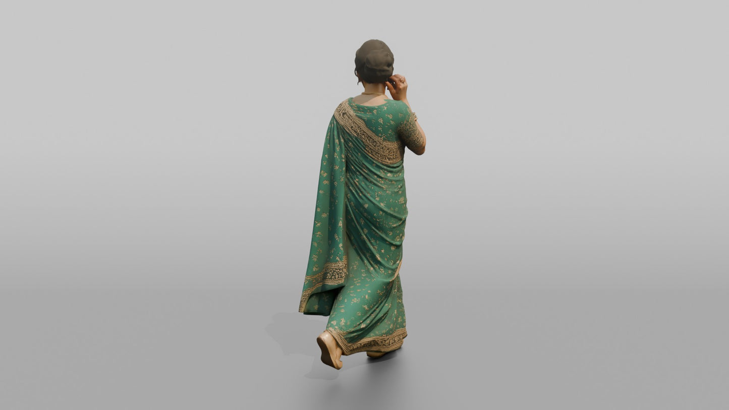South Asian Wedding Guest Adjusting Her Earrings