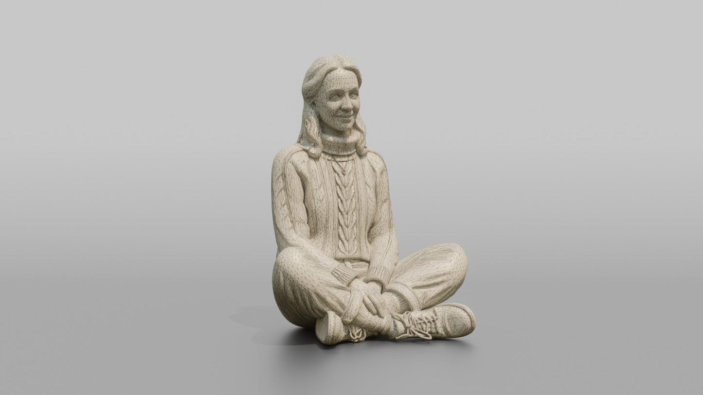 British Girl Sitting Cross-Legged on a Bench