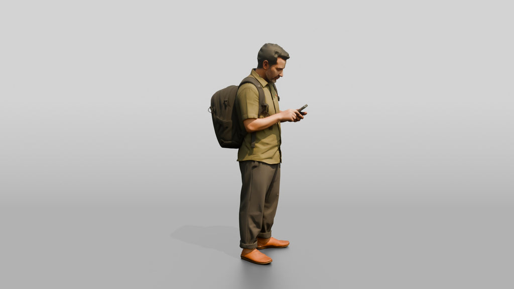 African Man with a Backpack Checking His Phone