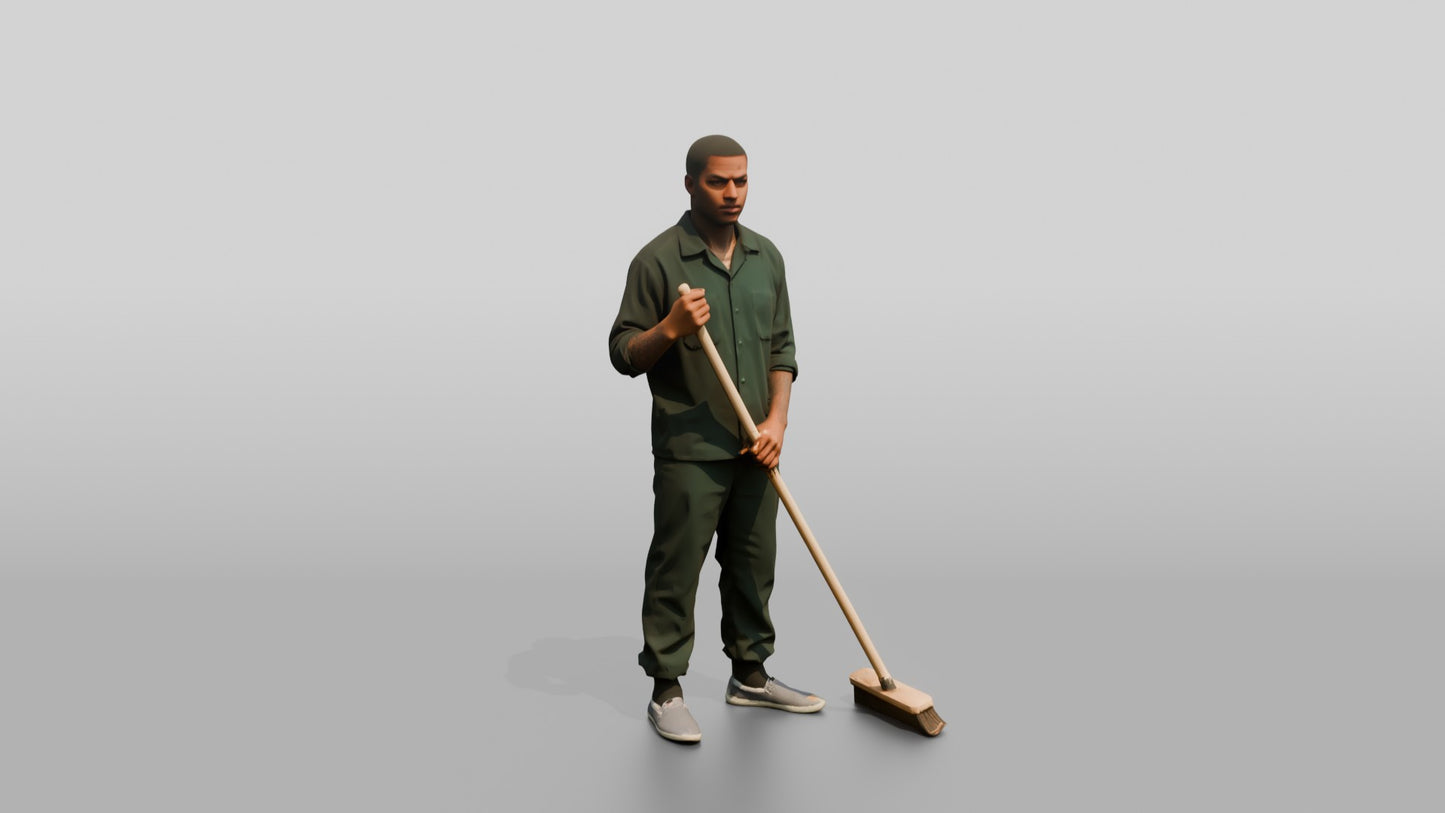 Black Male Prisoner in a Dark Green Uniform Holding a Push-broom