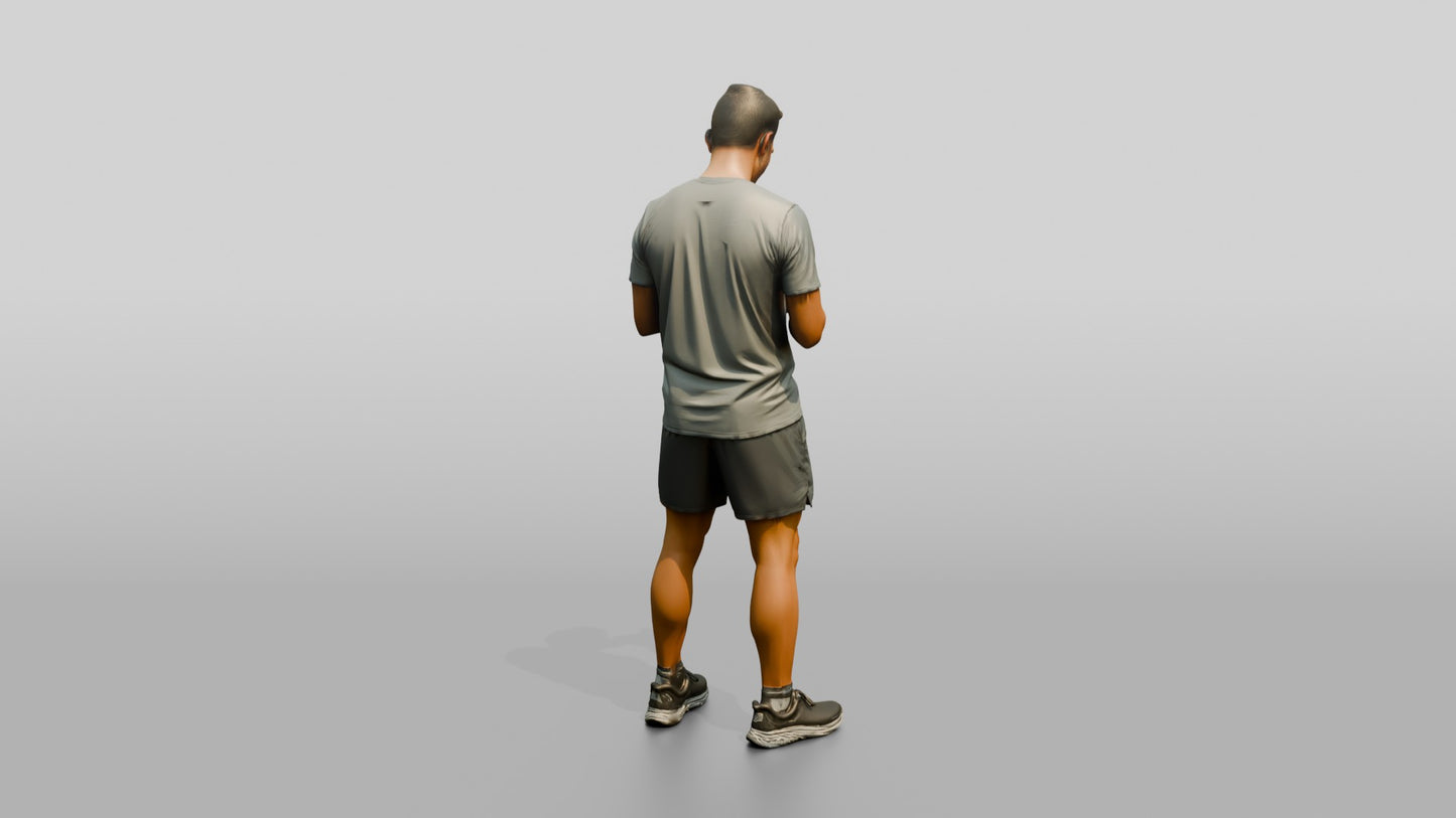 Middle-Aged Athletic Greek Man Checking His Phone