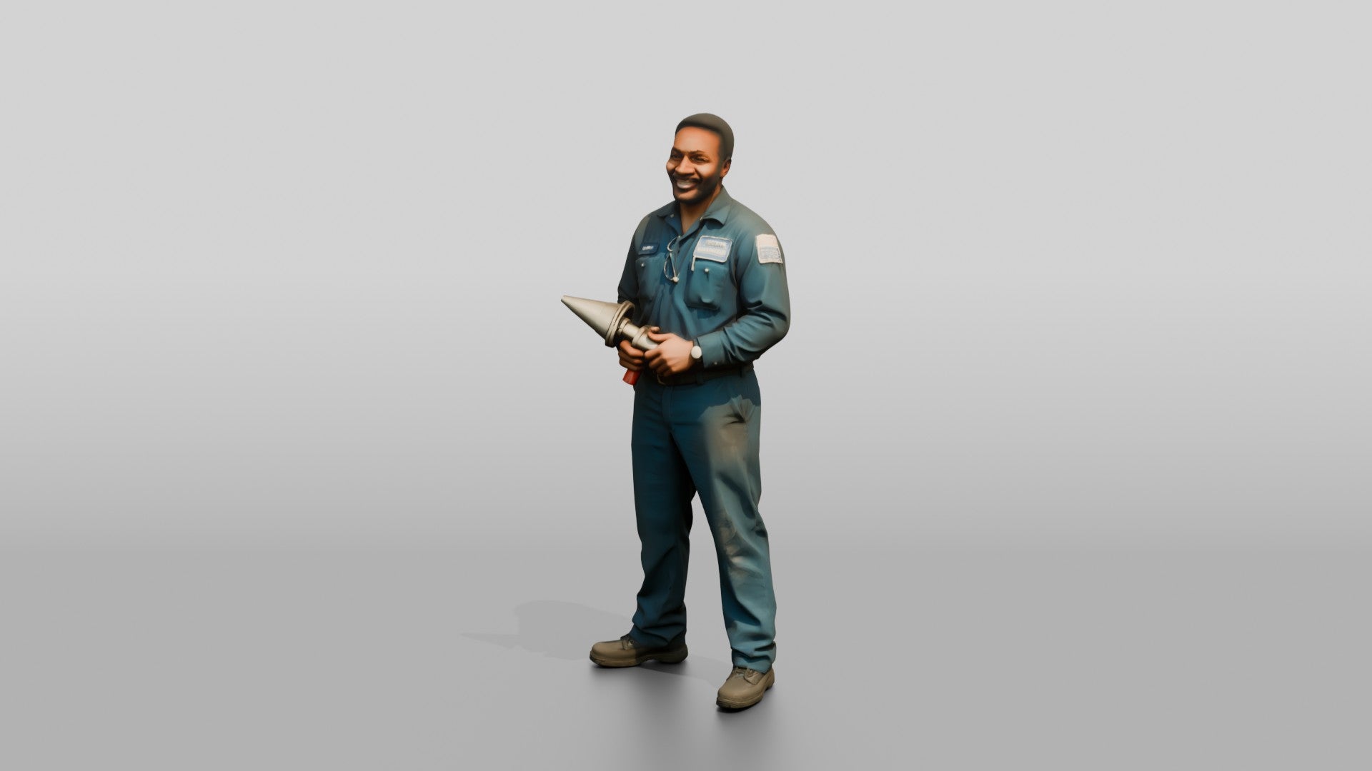 Mechanic Holding a Wheel Balancer Cone