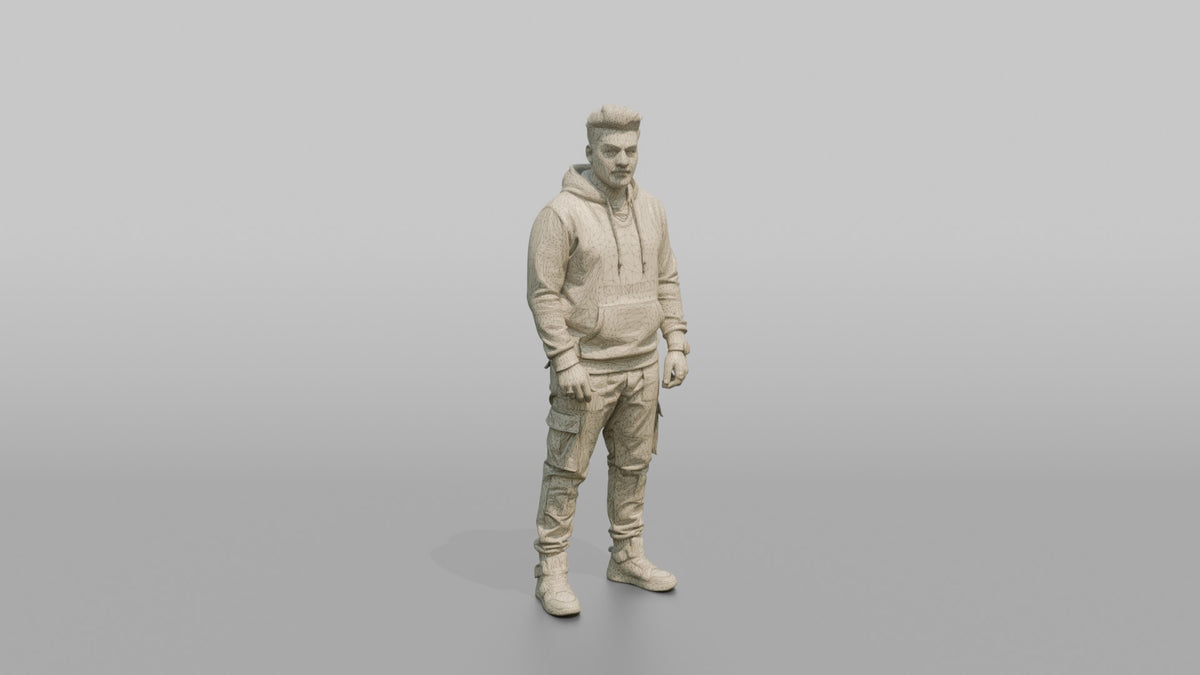 Patron Man Striking A Pose In Colorful Cargo Pants And A Graphic Hoodie - wireframe topology preview
