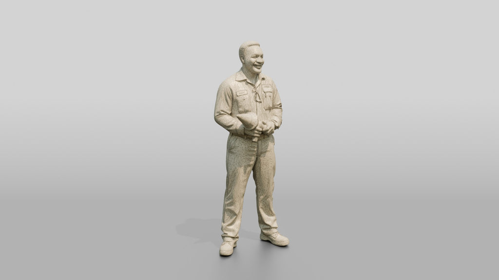 Mechanic Holding a Wheel Balancer Cone