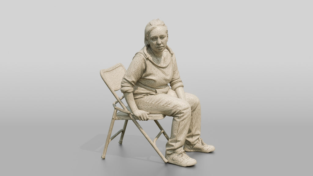 Homeless Woman Looking Off-balance and Sitting Heavily