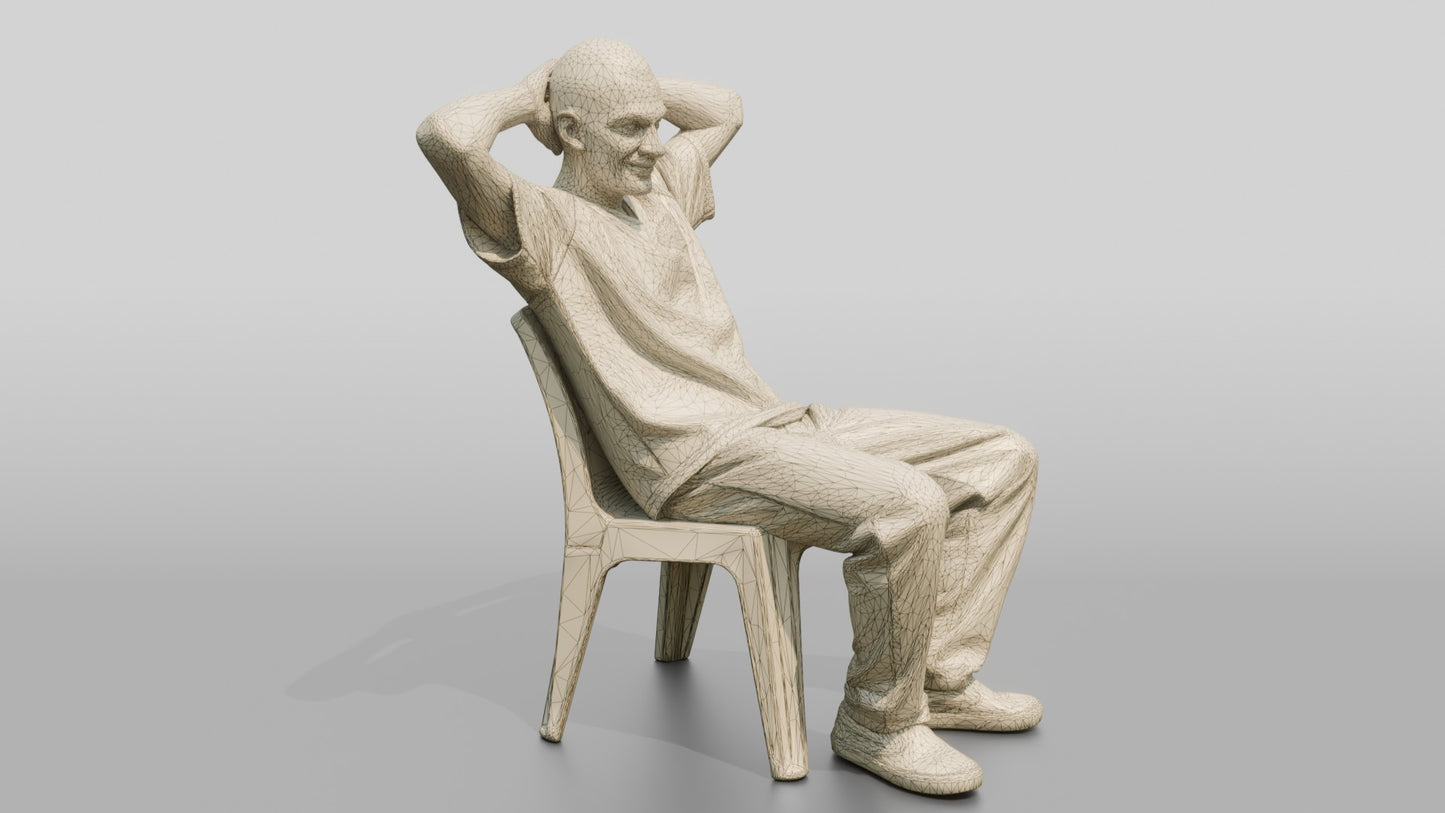 Caucasian Male Prisoner Leaning Back in a Hard Plastic Chair