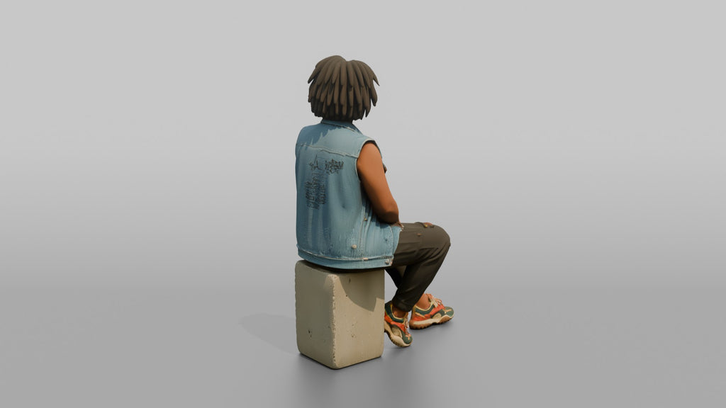 African Woman in Denim Vest Sitting on Concrete Block