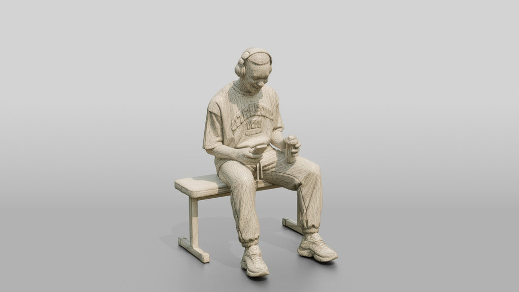 Man Sitting with Shaker and Headphones