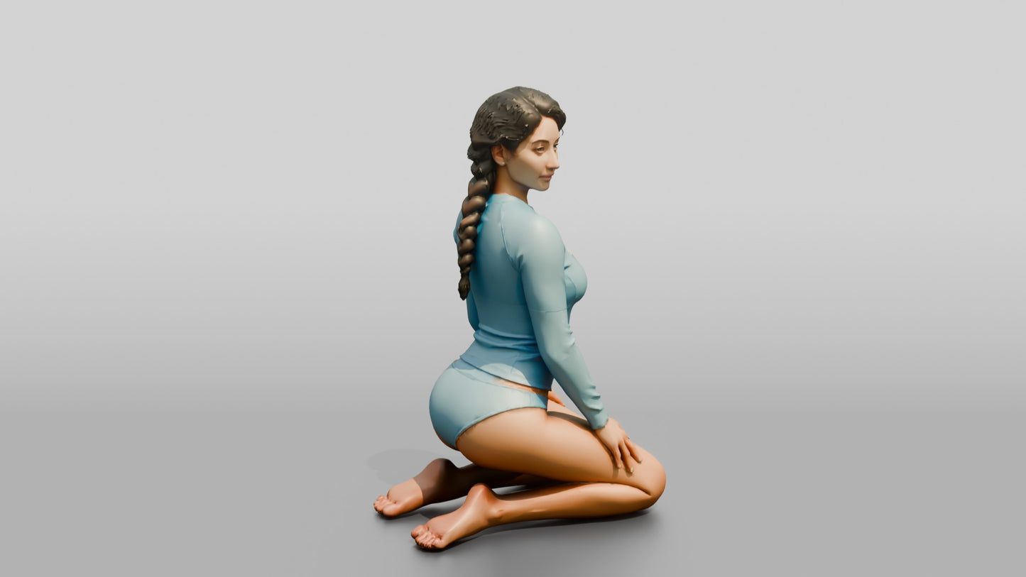Woman in Blue Rash Guard Kneeling