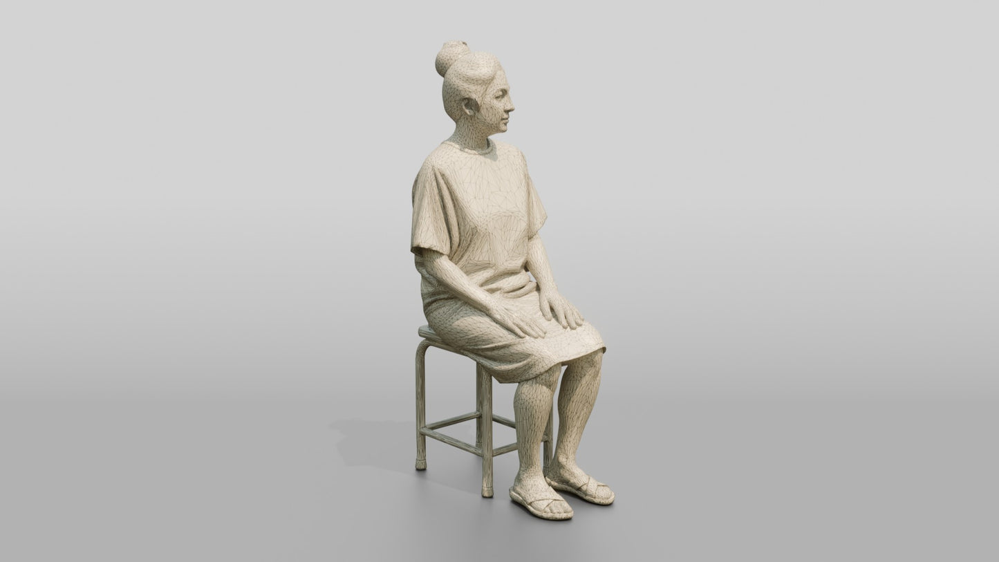 Woman Patient Sitting on a Stool