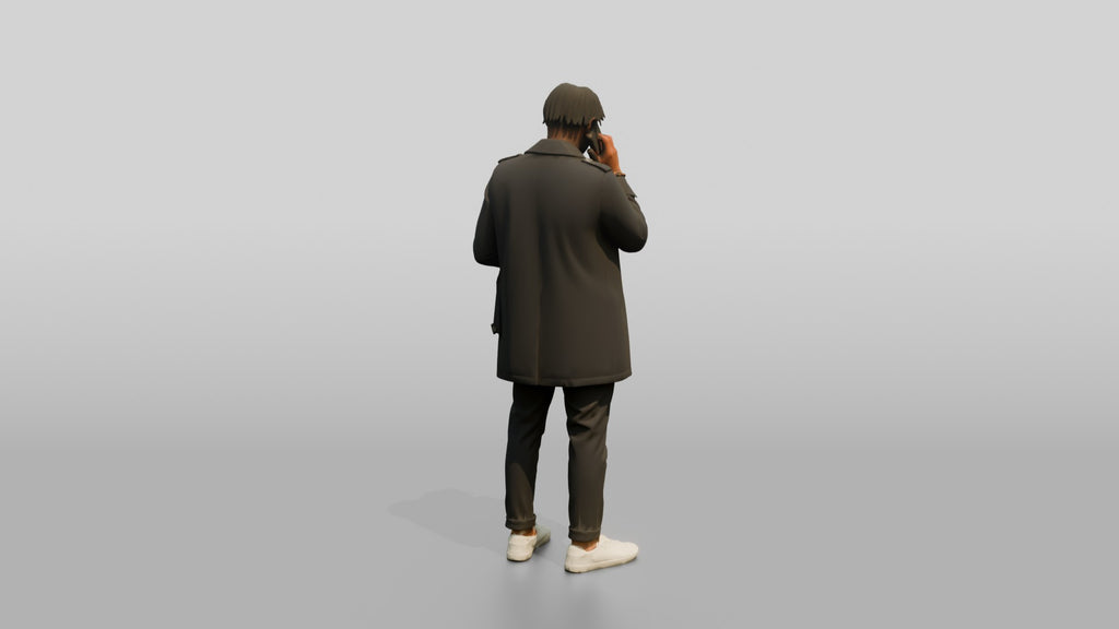 Stylish African Man in a Trench Coat on His Phone