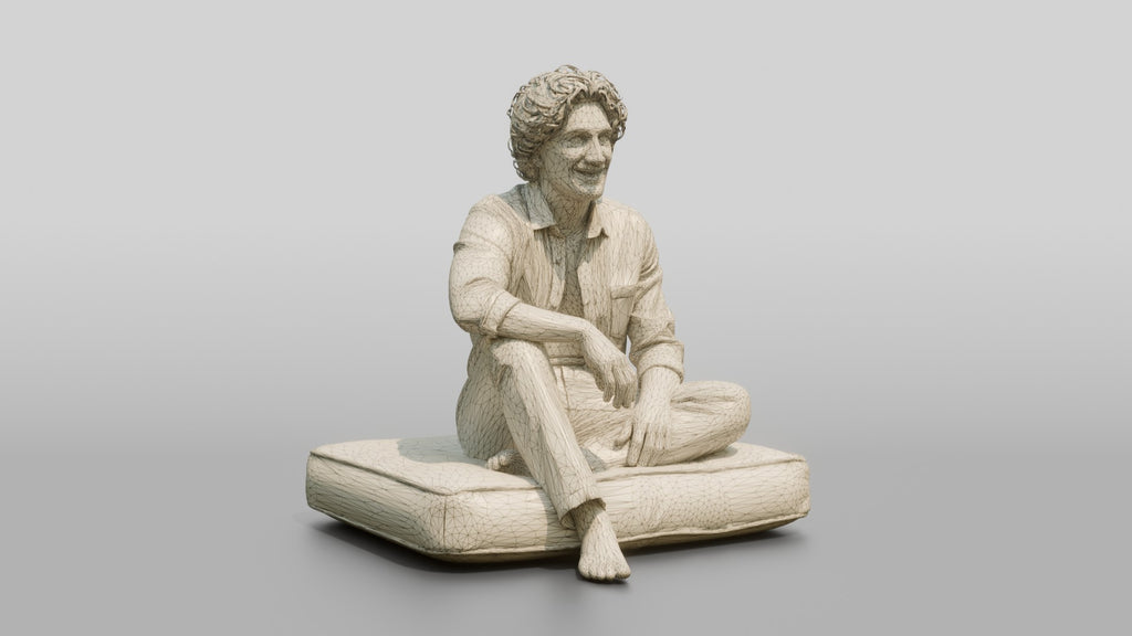 Man Sitting Cross-Legged in Linen