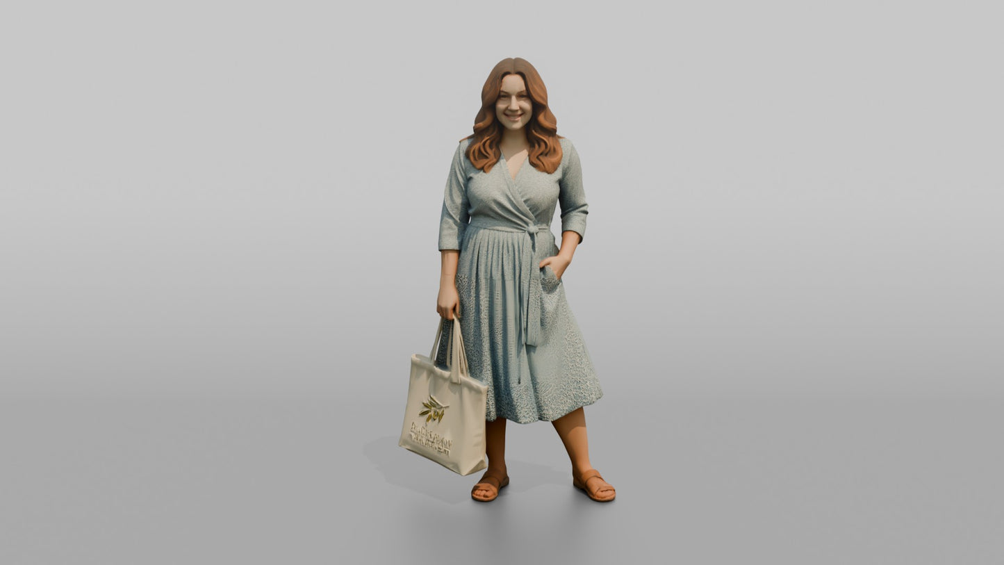 Woman Posing in a Wrap Dress Holding a Canvas Bag