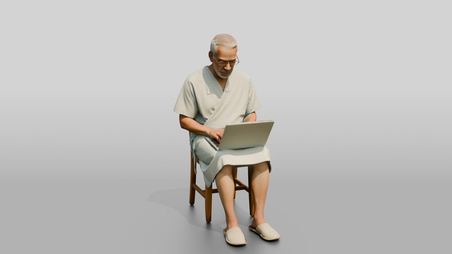 Elderly Man Patient Using a Laptop