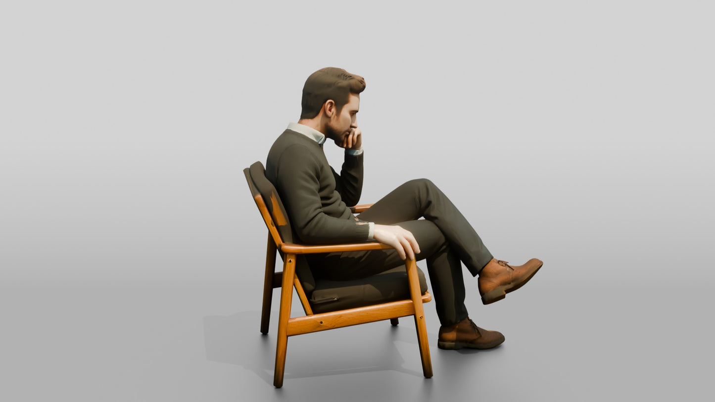 Man Sitting Thoughtfully in a Chair