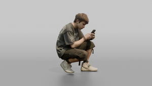 Teenage Boy Crouching to Look at His Phone - 3D character model, view 1
