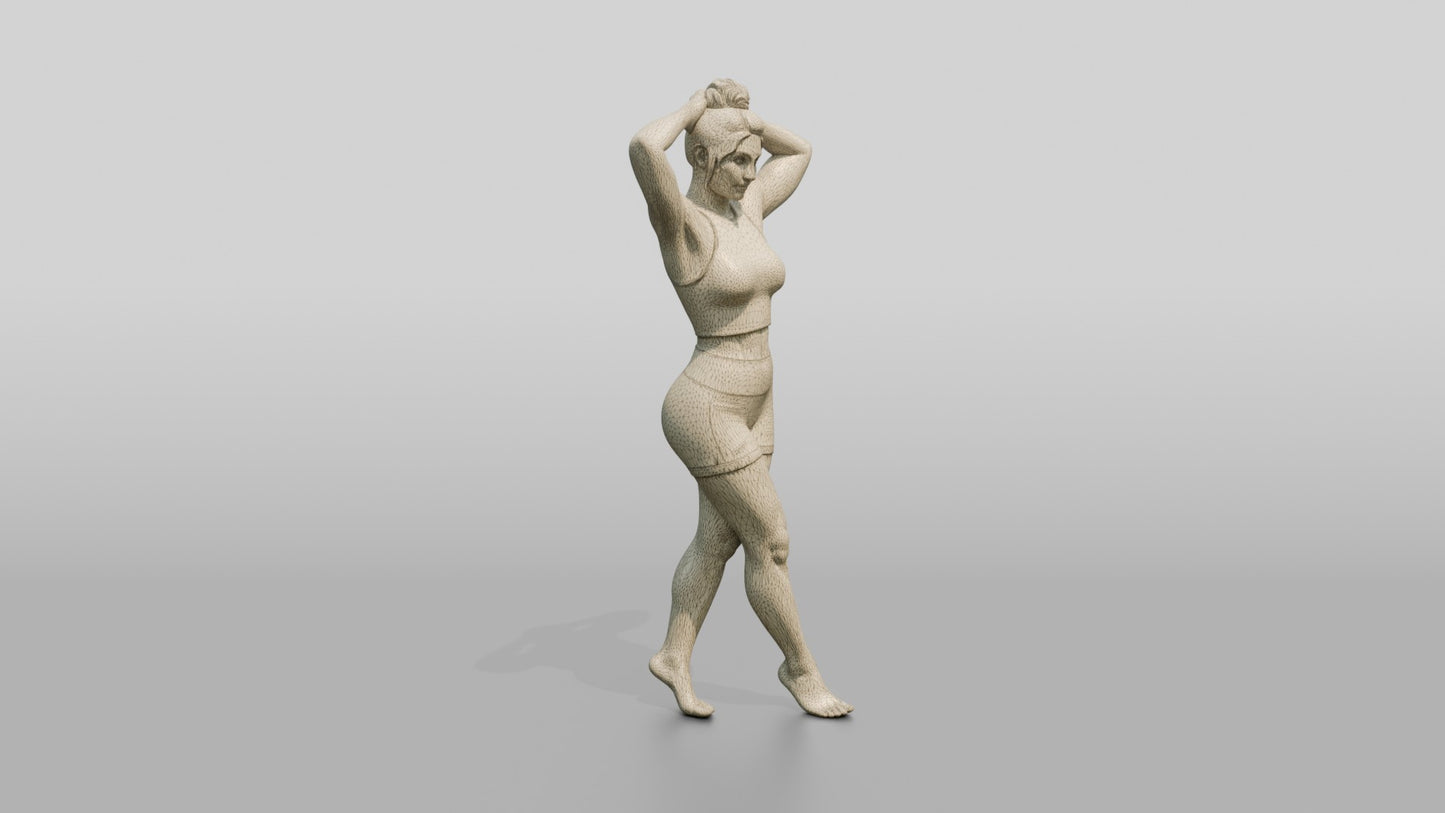 Woman in Olive Activewear with Hands in Her Hair