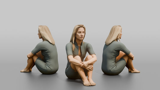 Surfer Sitting and Hugging Her Knees