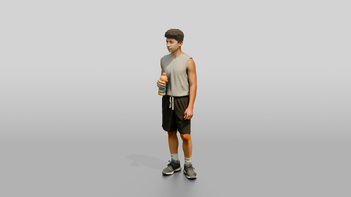 Slender Greek Teenage Boy Holding a Sports Drink