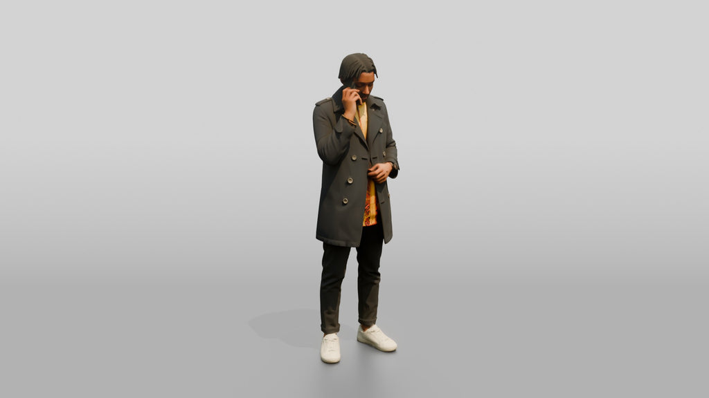 Stylish African Man in a Trench Coat on His Phone