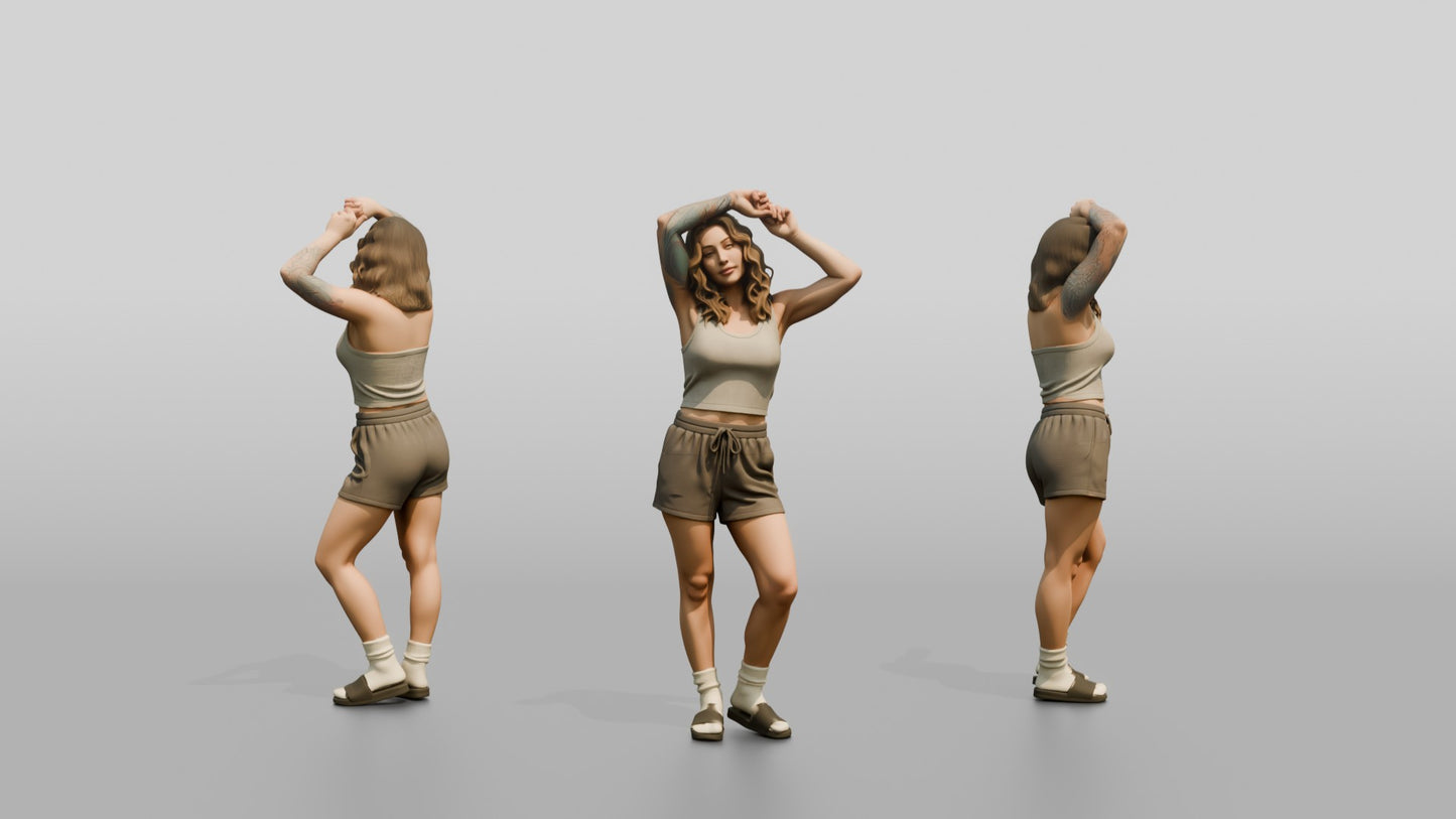 Woman Running Hands Through Wavy Hair in Cream Outfit