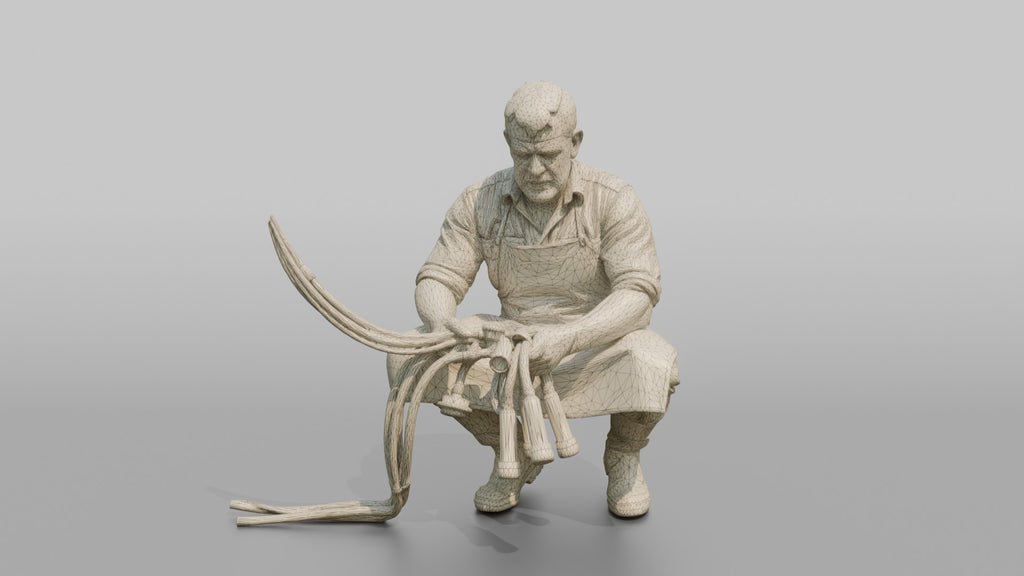 Farmer Crouching Down Holding Automated Milking Apparatus Equipment