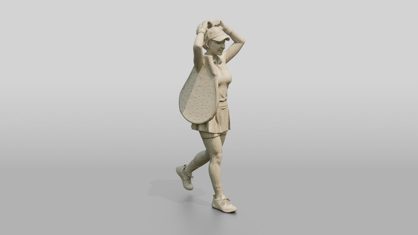 Female Tennis Player Fixing Her Ponytail