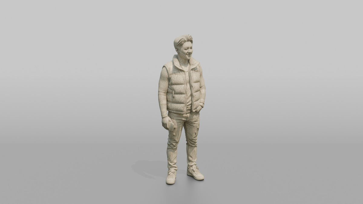 Patron Man Striking A Confident Pose In A Bright Puffer Vest - wireframe topology preview