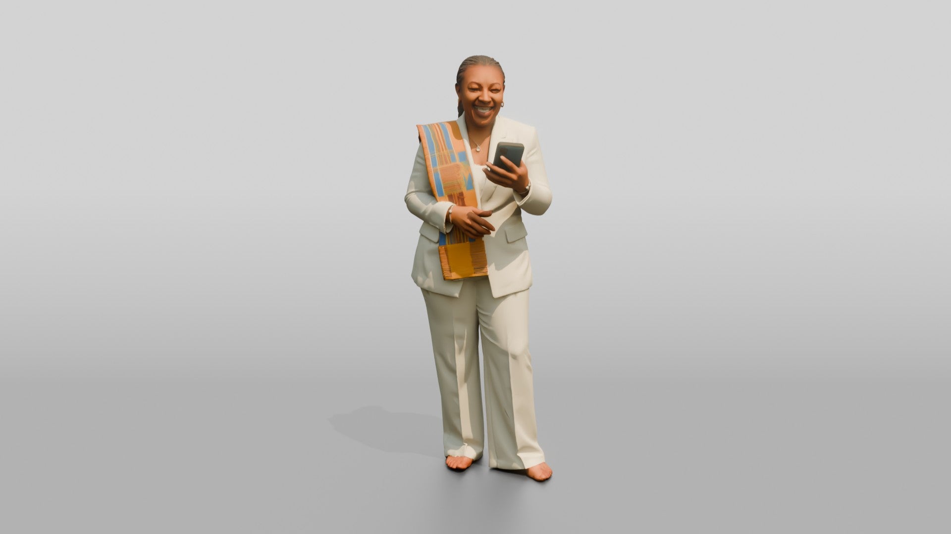 African Woman in a White Pantsuit Laughing at Her Phone