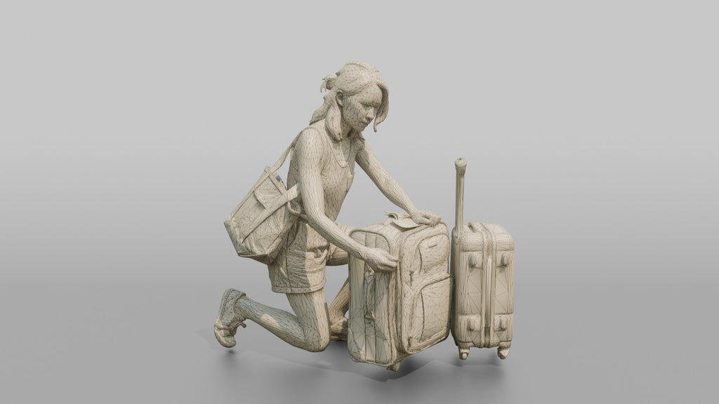 Traveler Kneeling To Zip Her Suitcase