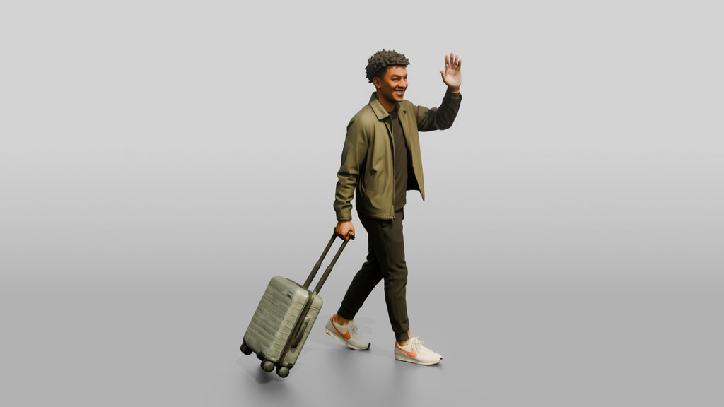 Young Black Man Waving and Smiling Pulling Rolling Suitcase