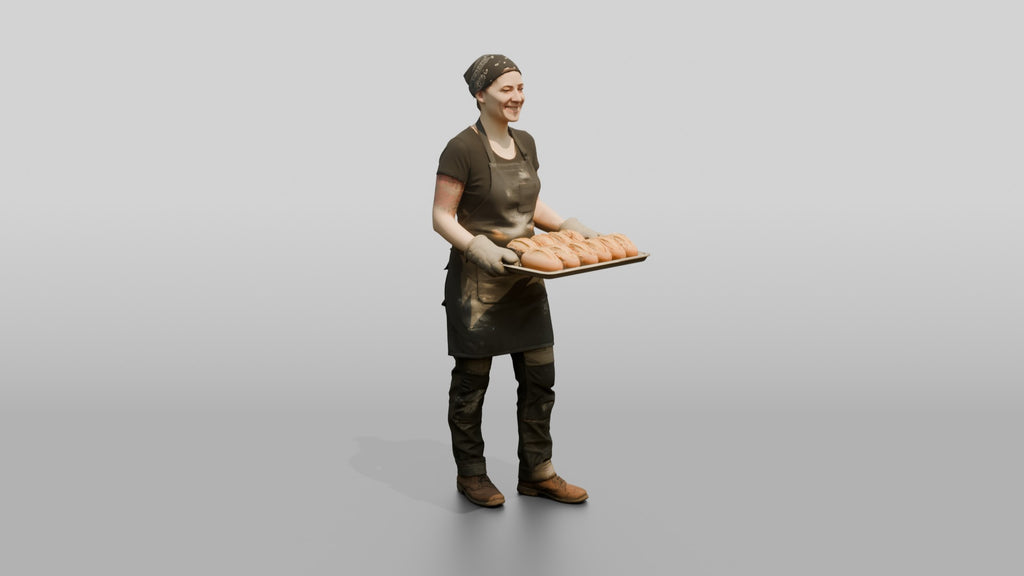 Baker Pulling Sourdough Loaves