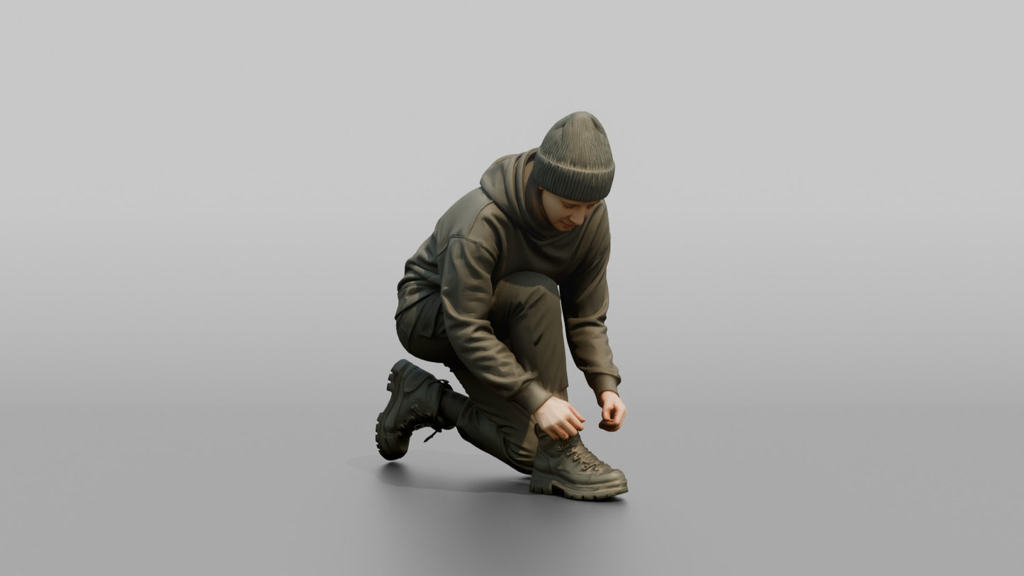 Woman Kneeling to Adjust Her Boots