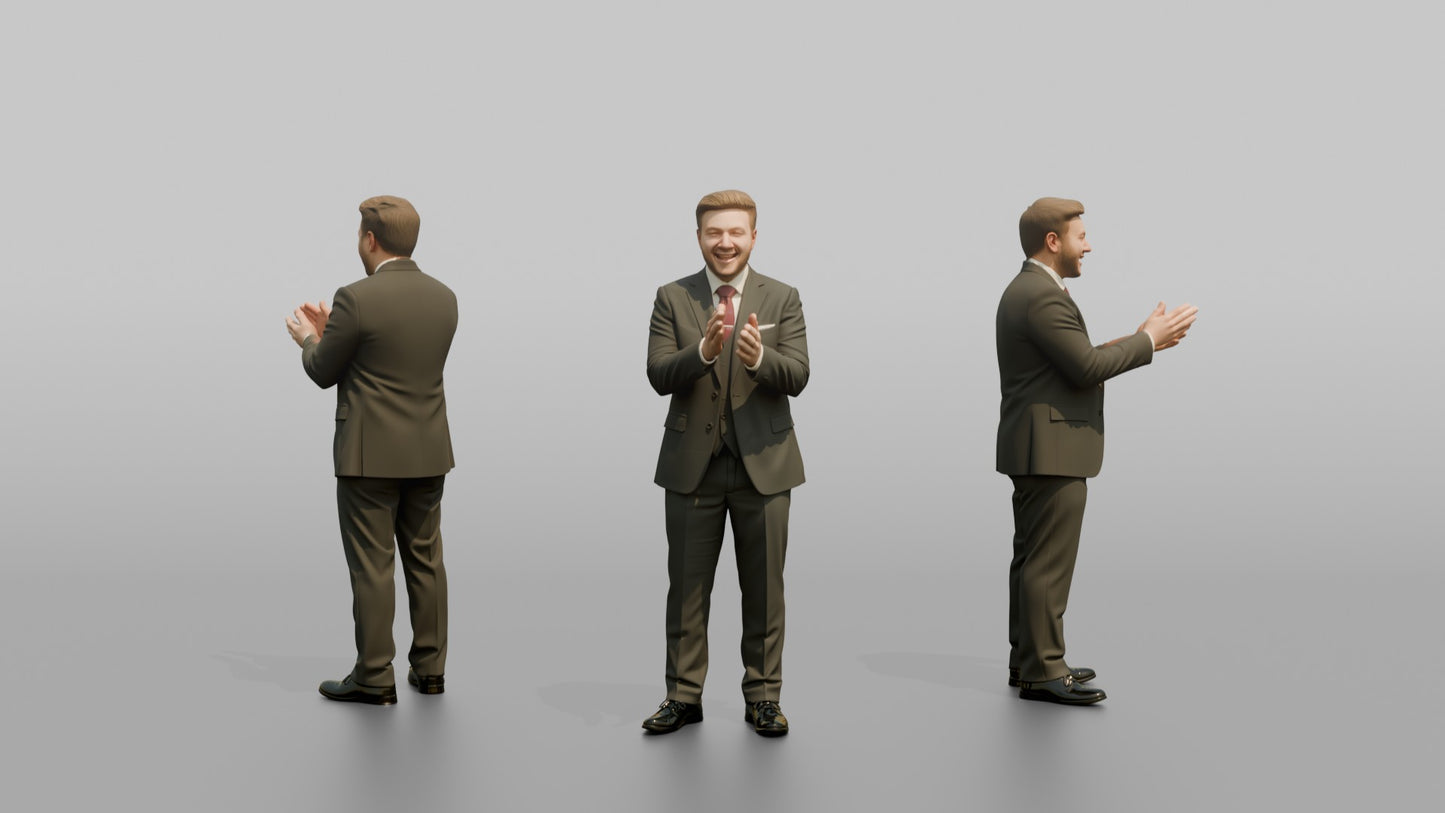 Groom Clapping in a Charcoal Grey Three-Piece Suit