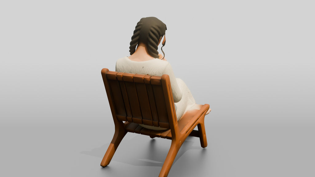 Woman on a Chair Checking Her Phone