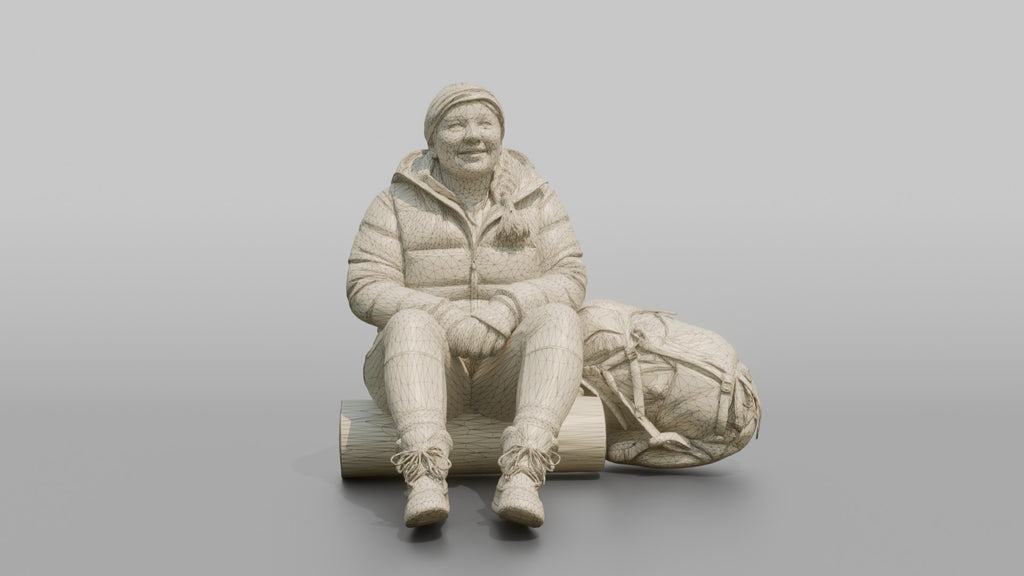 Hiker Sitting on a Rolled Foam Sleep Pad