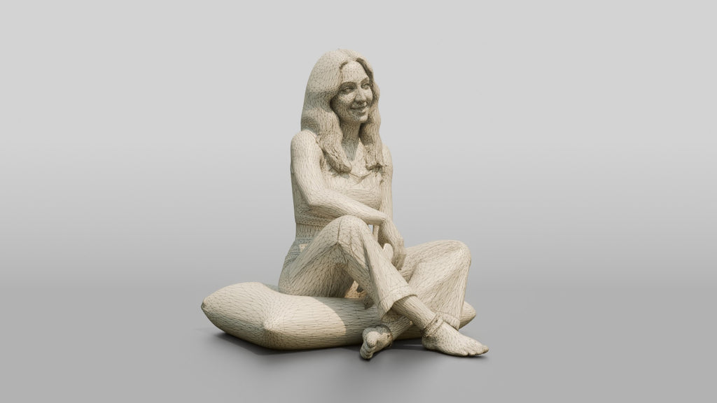 Woman Sitting Cross-Legged on a Cushion