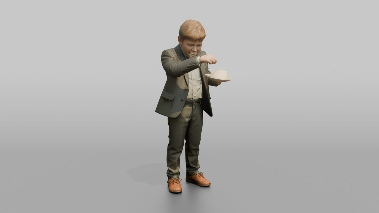 Young Boy Eating a Slice of Wedding Cake