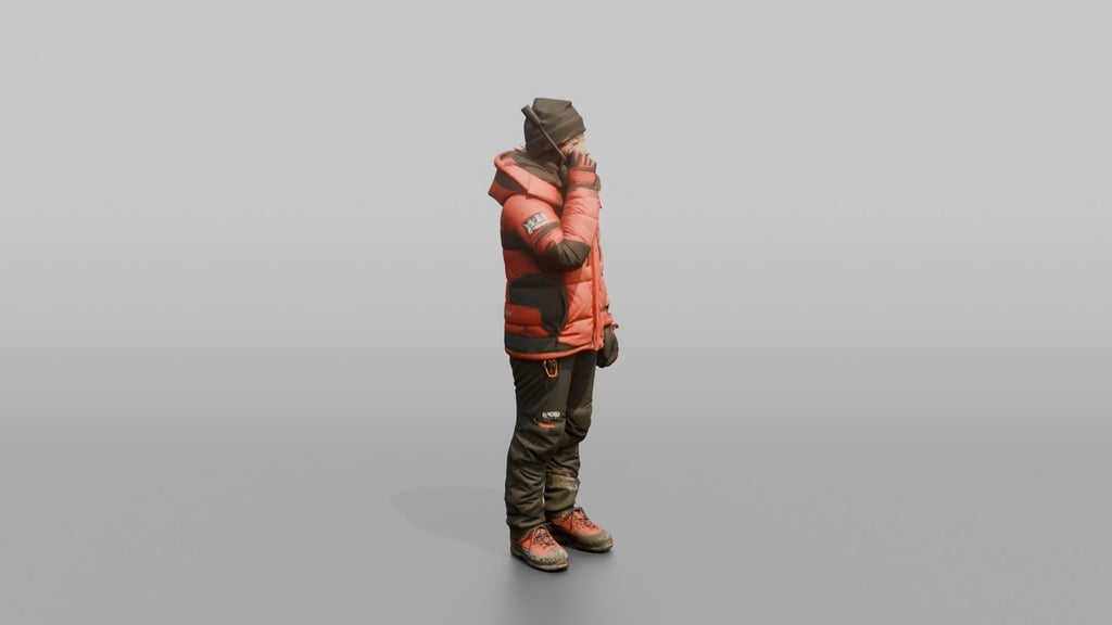 Expedition Member Holding a Satellite Phone
