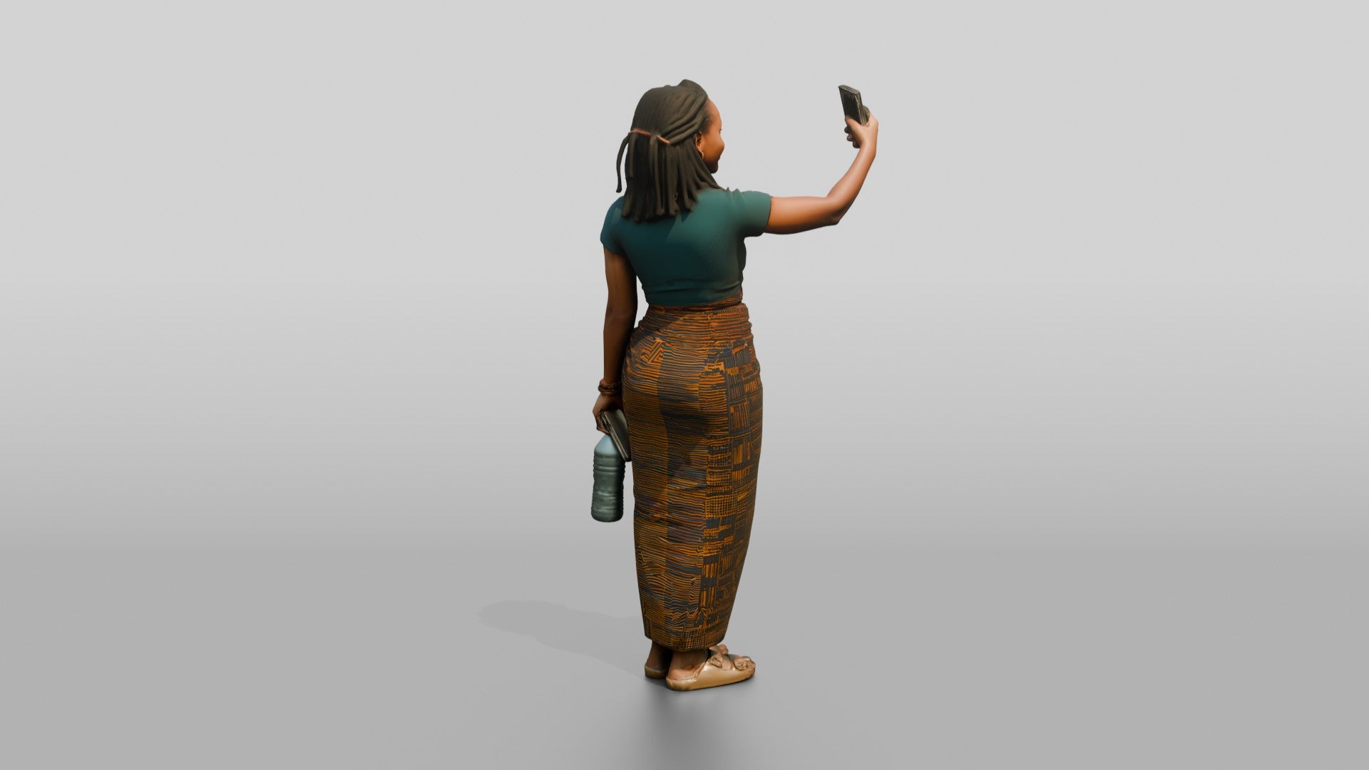 Young African Woman Taking a Selfie in a Wrap Skirt