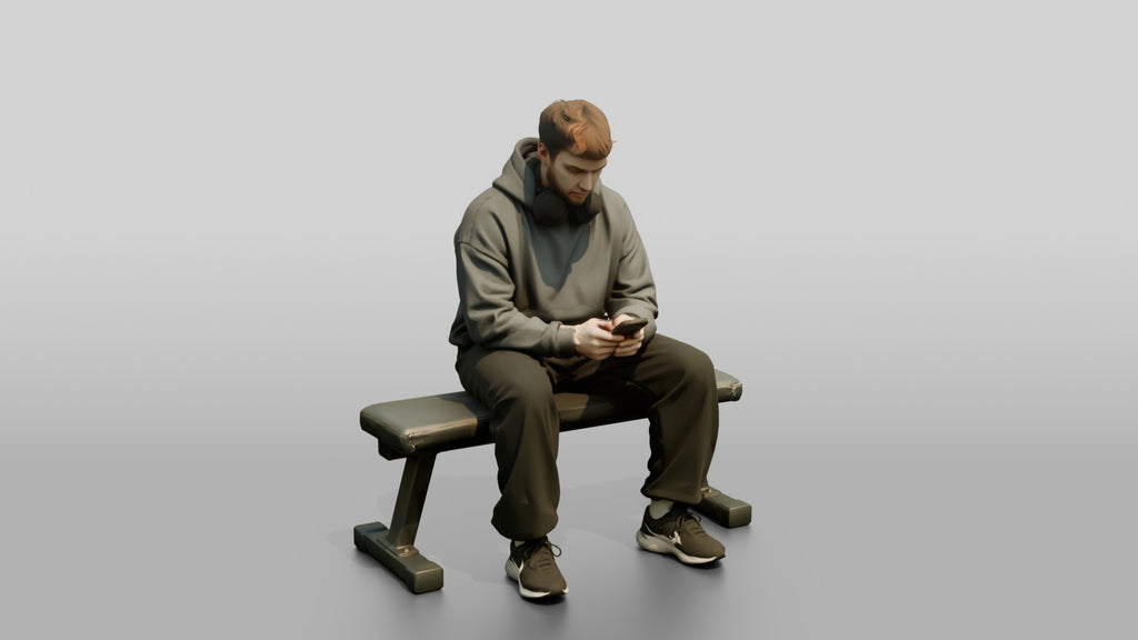 Man Sitting on Fitness Bench