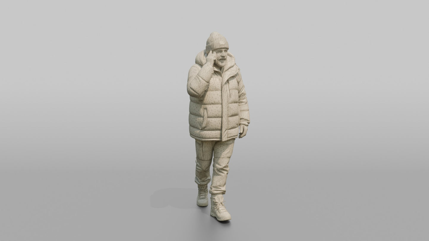 Scandinavian Man Talking on His Phone in a Puffer Coat