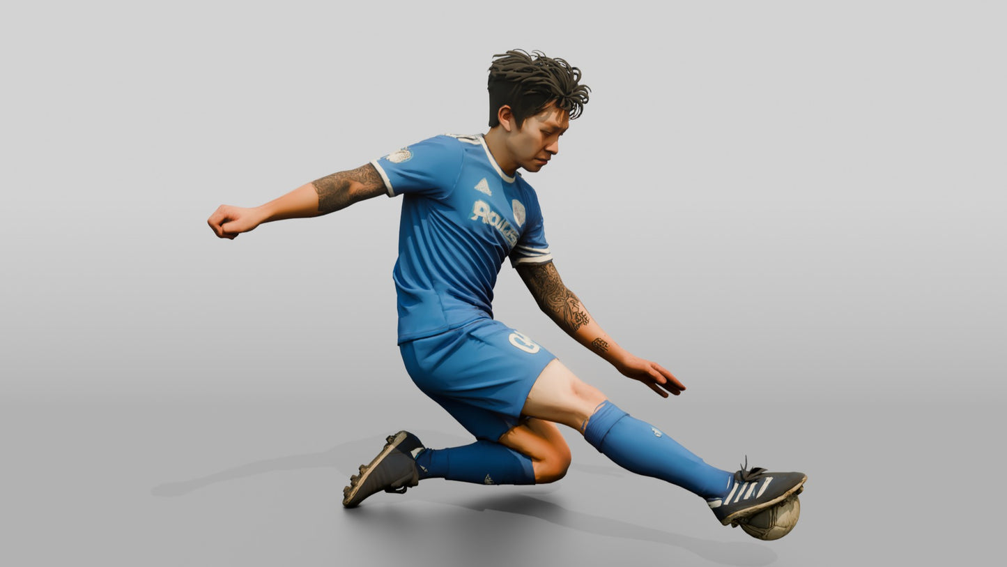 Soccer Player Executing a Sliding Tackle