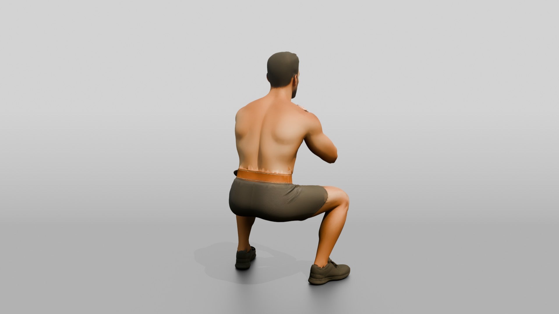 Man Squatting with Fitness Gloves