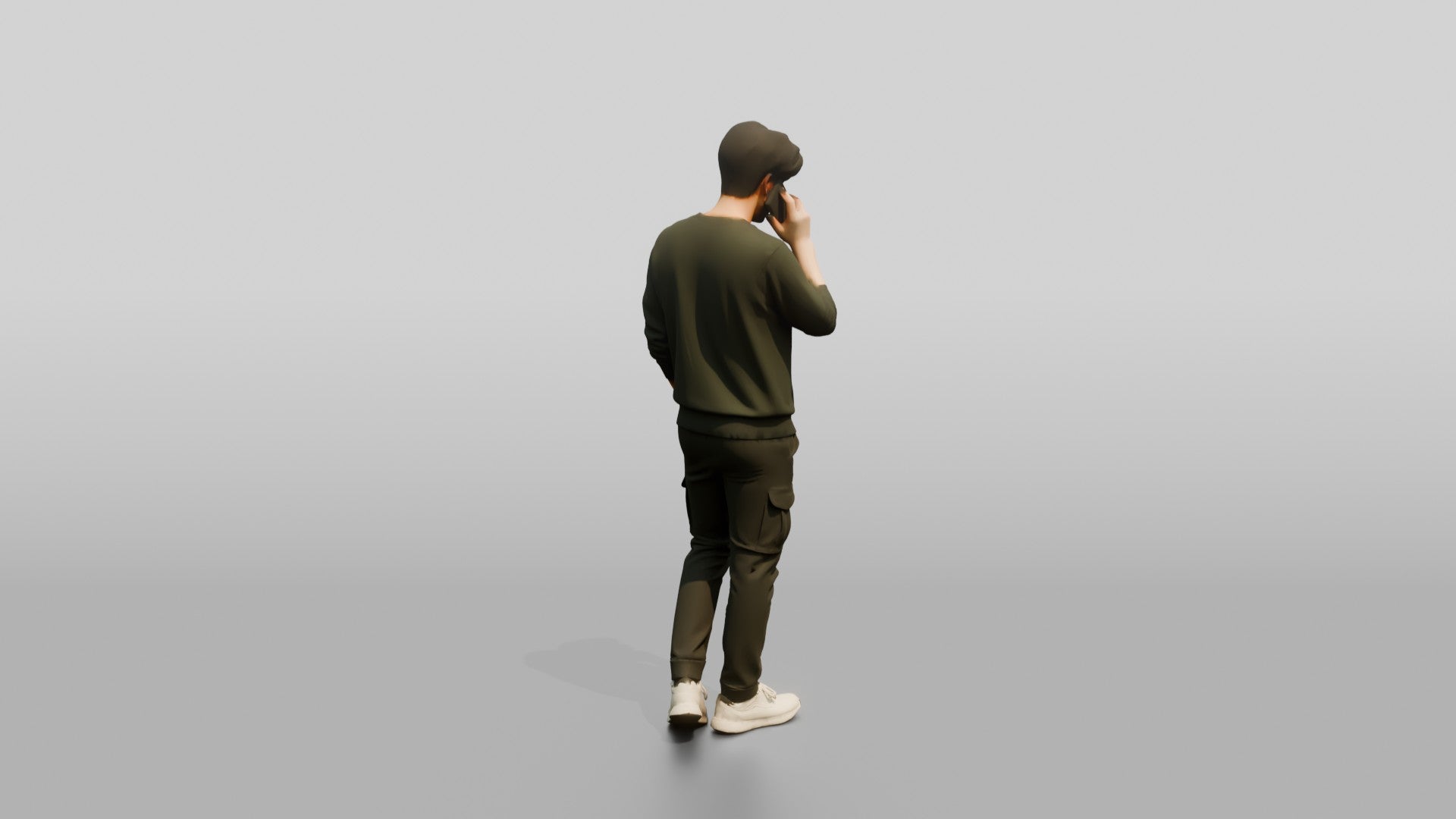 Young Chinese Man Walking and Talking on Phone